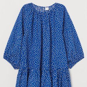 Blue with white polkadot dress.